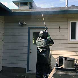 Cleaning Gutters on House